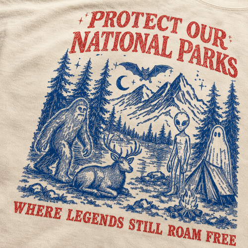 Close-up of red and navy cryptid national parks shirt print