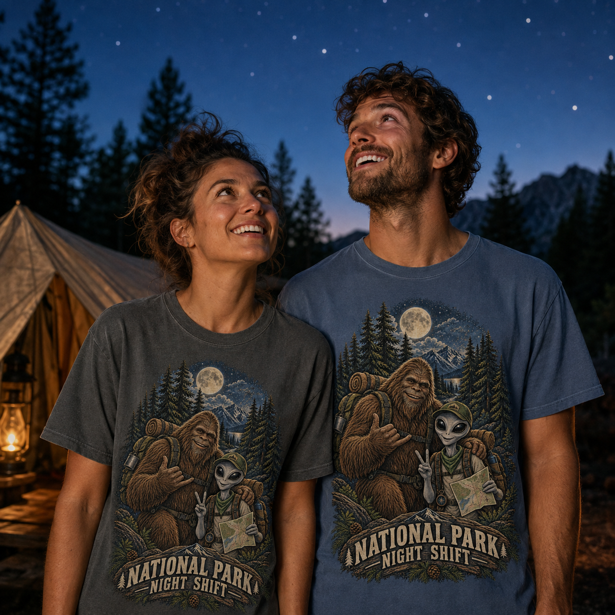 Friends wearing Graphite and Blue Jean National Park Night Shift tees at a starlit campsite