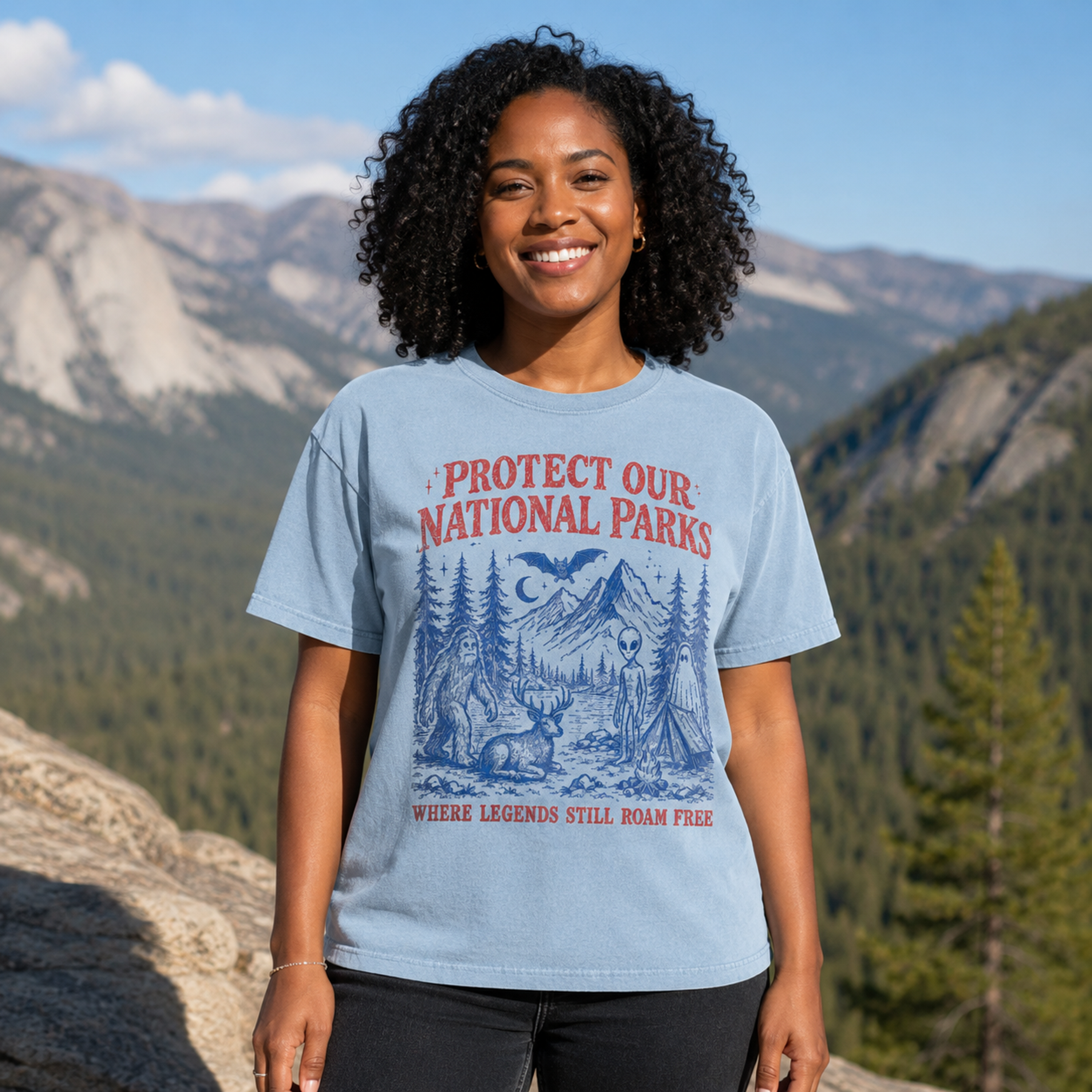 Woman wearing a Chambray cryptid national parks shirt at an overlook