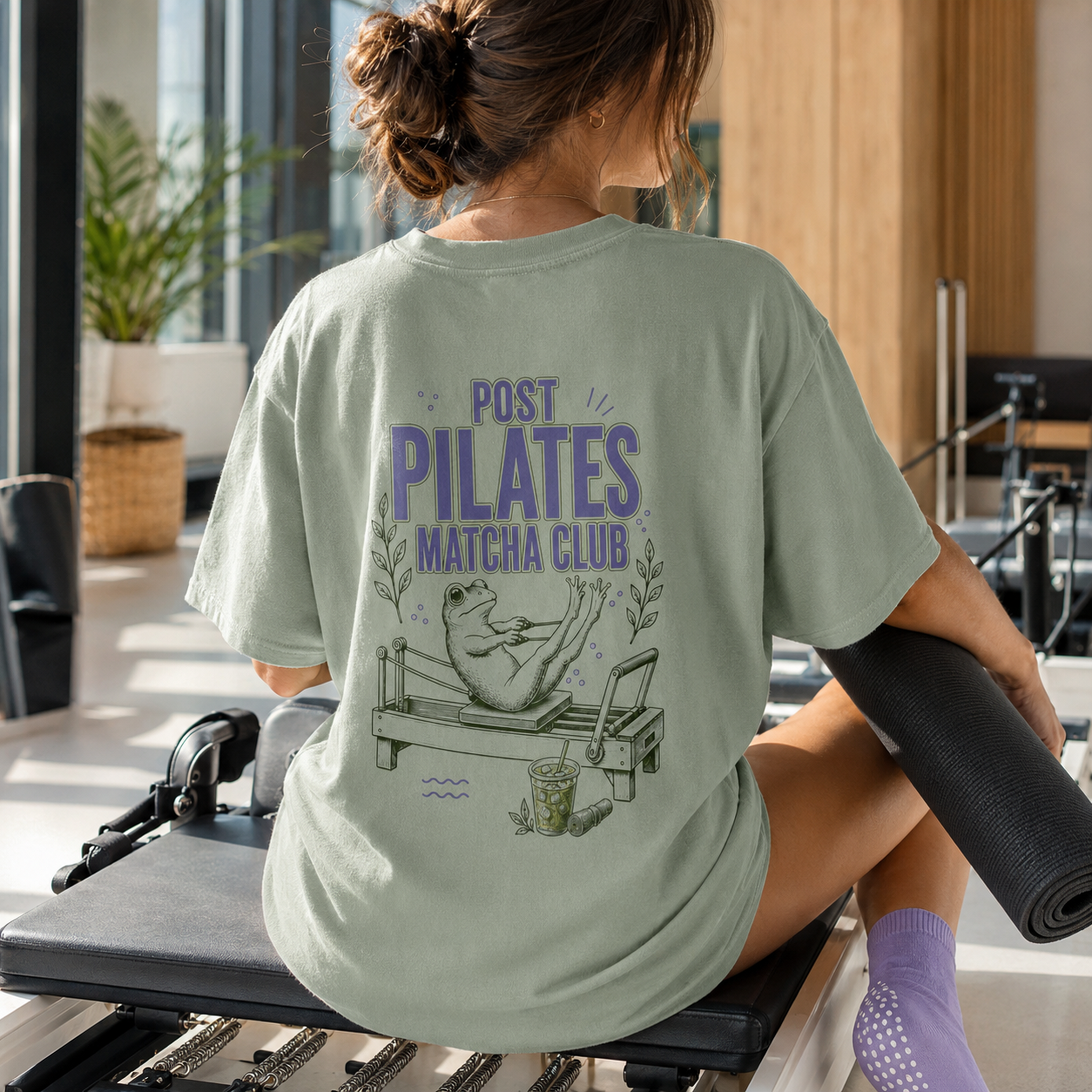 Bay green Post Pilates Matcha Club tee in a reformer Pilates studio