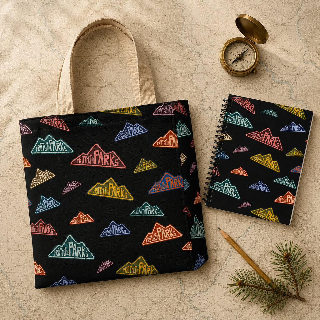 Protect Our Parks tote and notebook bundle — topographic map flat lay