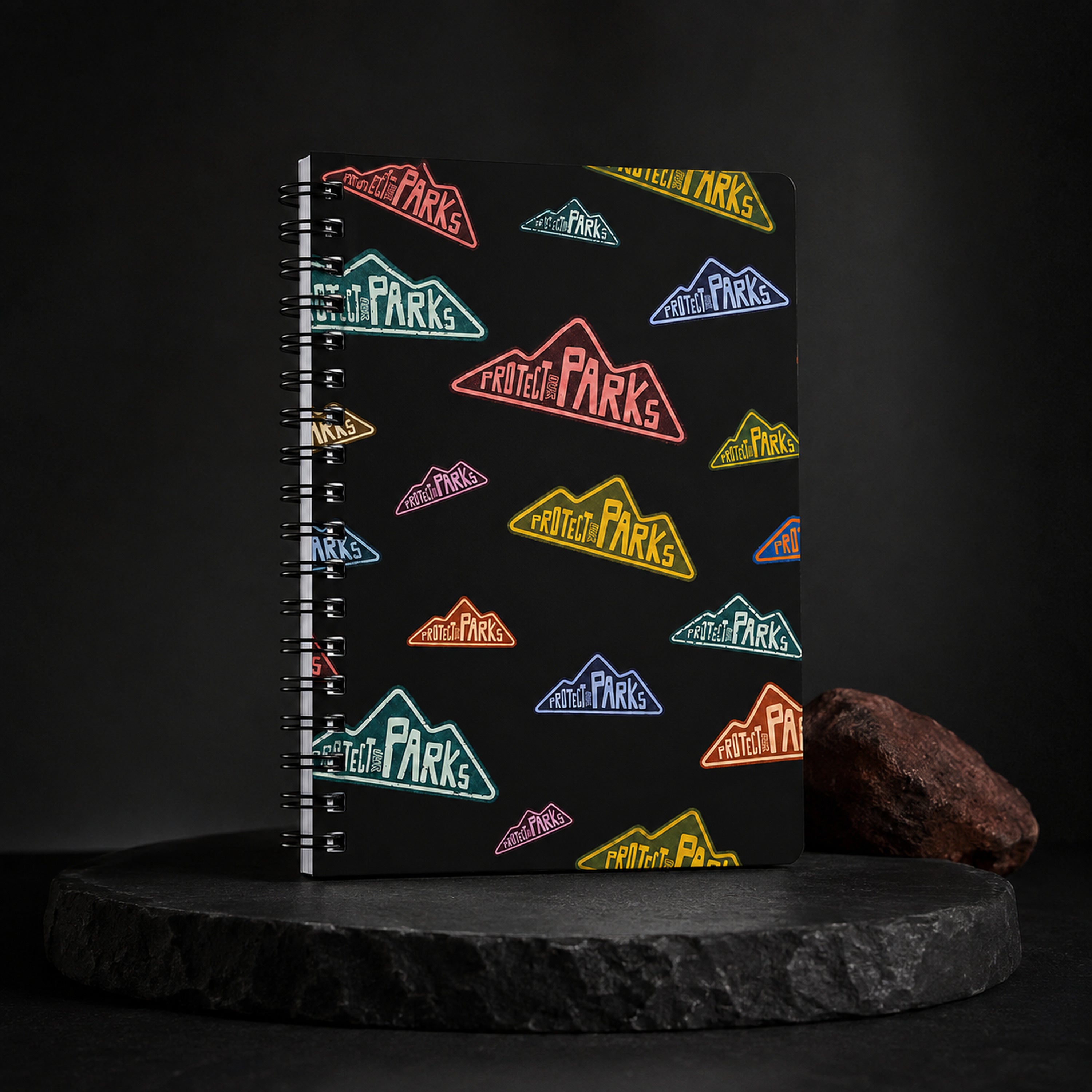 Protect Our Parks black spiral notebook — final minimal black hero