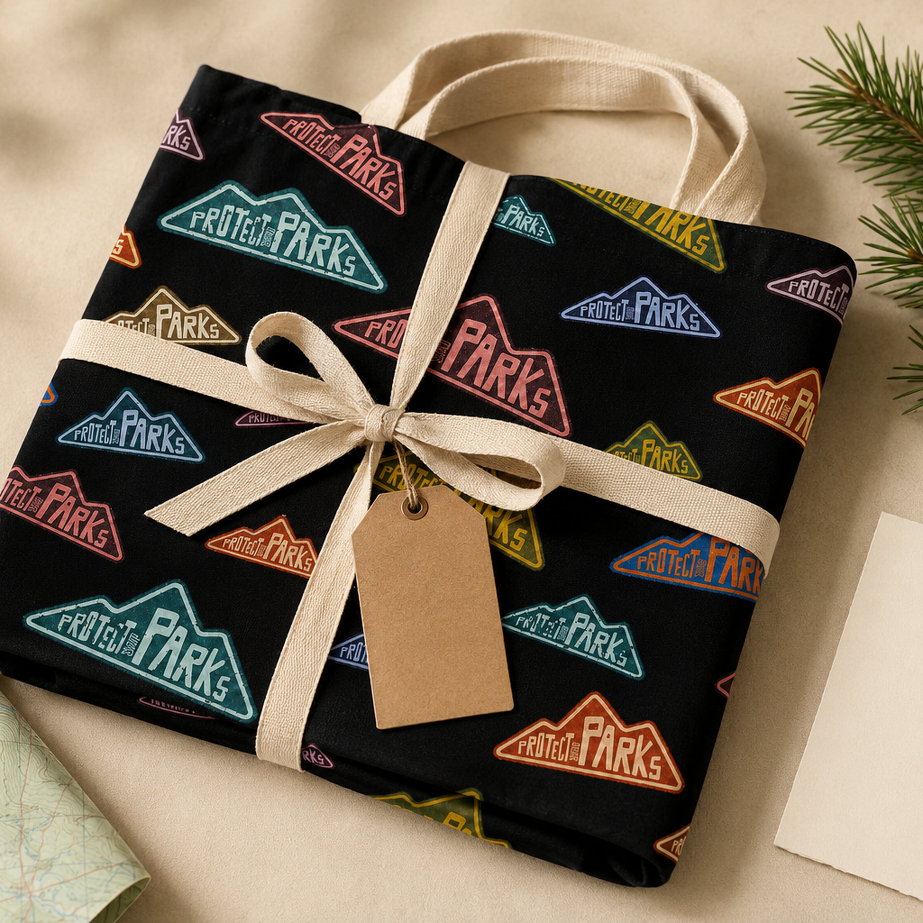 Protect Our Parks black all-over-print tote — gift ready kraft presentation